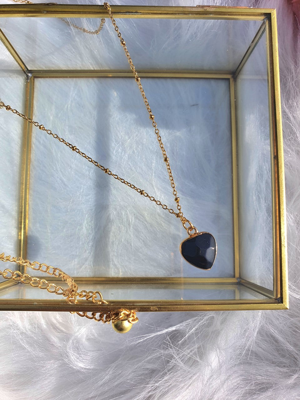 Ketting Onyx hartje – goud